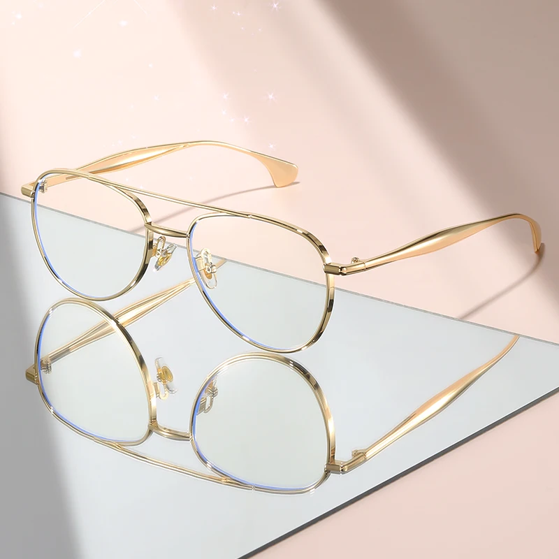 2025 يحتوي الإطار الصغير المعدني البيضاوي الشعاع المزدوج الجديد على عدسة إضاءة مسطحة كلاسيكية وبسيطة للارتداء اليومي