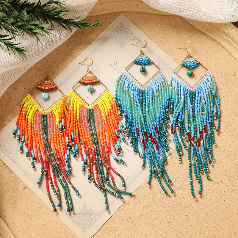 

Beaded earrings Geometry Pendant Tassel Originality Hand knitting Bohemia Alloy Tide Simple Rice bead earrings