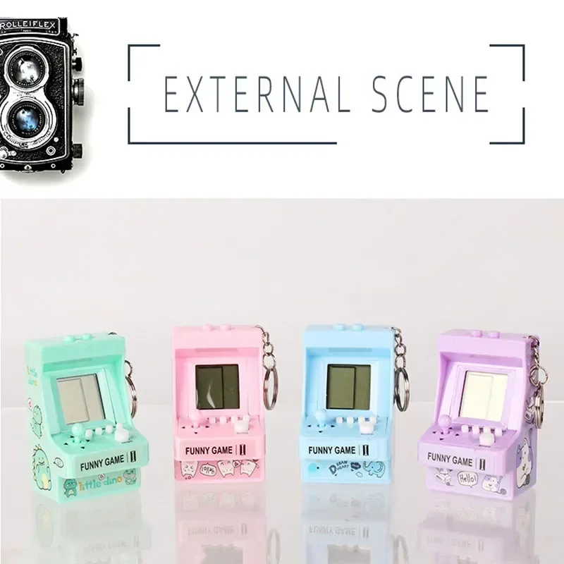 Mini llavero de bolsillo portátil con anillo integrado, consola de juegos electrónica de mano para máquina de juegos de juguete para niños, 26