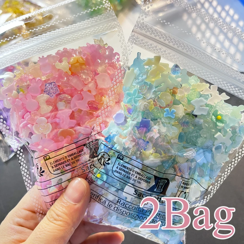約 1000-1200 個混合ちょう結びフラワーネイルアートチャーム 2 バッグピンク/ブルー/パープル蝶椿ネイルパーツマニキュアアクセサリー