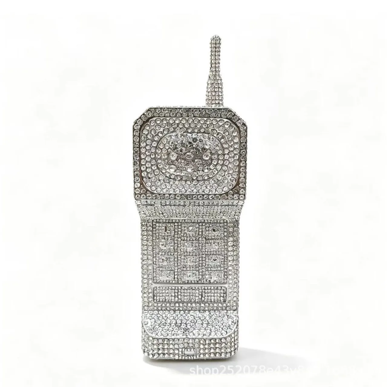 The new mobile phone has a unique shape and a diamond-encrusted dinner bag.
