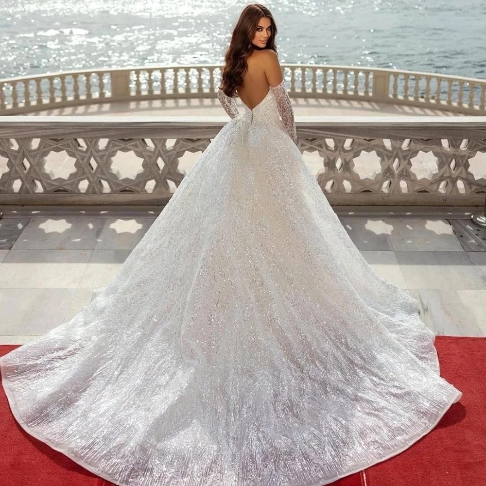 Abito da sposa sexy con scollo a V profondo senza schienale Paillettes scintillanti Perline Abito da sposa Abito da sposa a sirena con strascico staccabile di lusso personalizzato