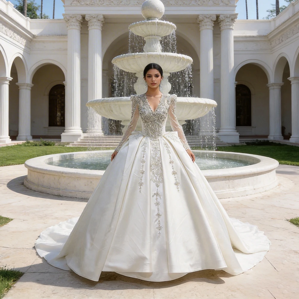 

Индивидуальные свадебные платья с длинными рукавами 2026: кружевные, с V-образным вырезом, романтичные, с шлейфом, бальные, из атласа