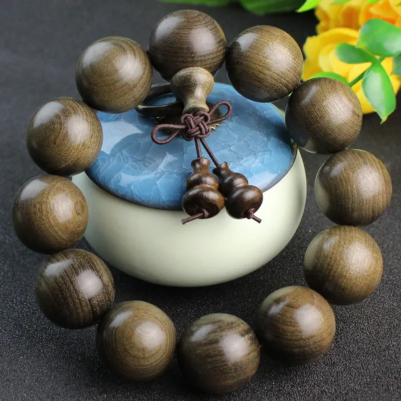 Dark golden nanmu wood Buddhist bead bracelet, Sichuan ebony unisex cultural accessory, handcrafted jewelry with a subtle fragra