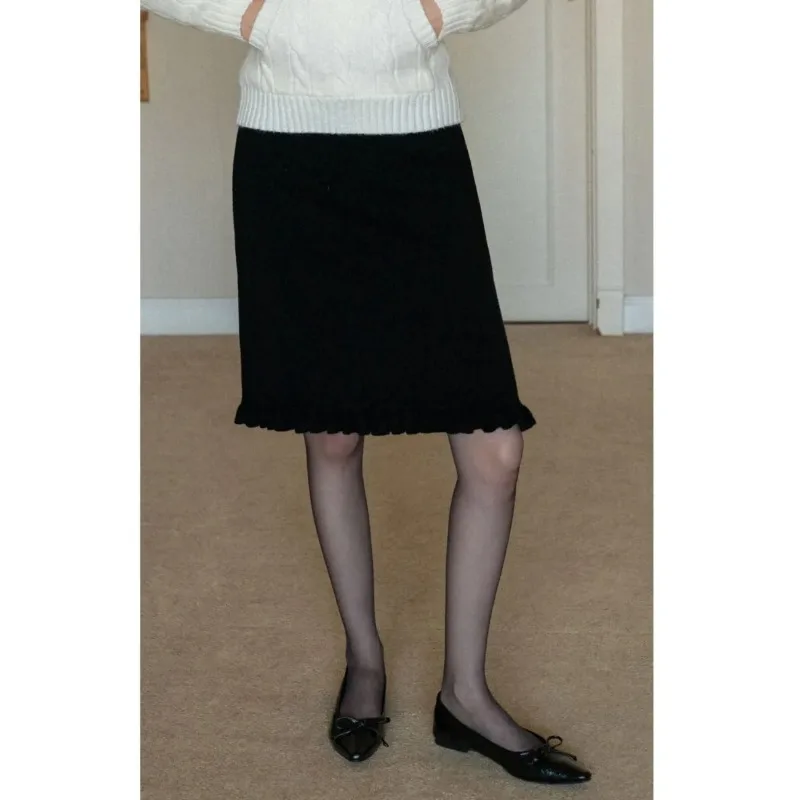 

Женская черная вязаная мини-юбка на осень-зиму с высокой талией, оборками по низу, А-силуэт, из смесовой шерсти