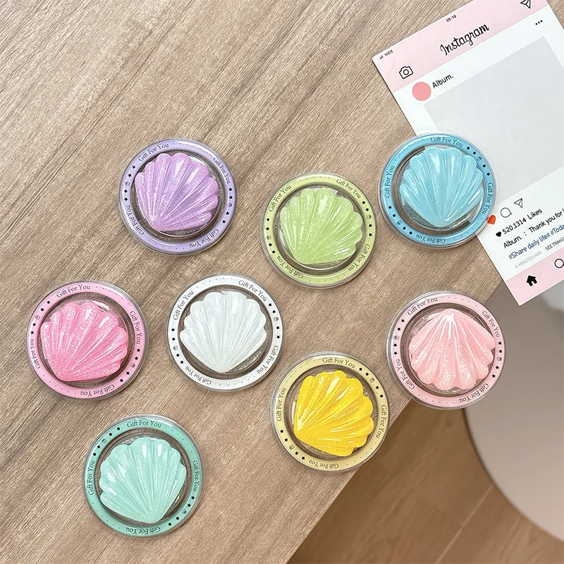 

Magnetic Magsafe Phone Airbag Stand with Glitter Shell Design - Foldable and Stable for Watching TV on Desktop