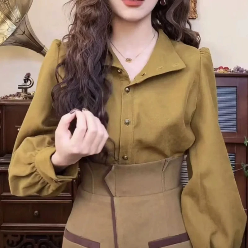 20224 香港スタイルのレトロな気質スタンドアップカラー秋の新スタイル長袖シャツデザインフレンチトップ女性服