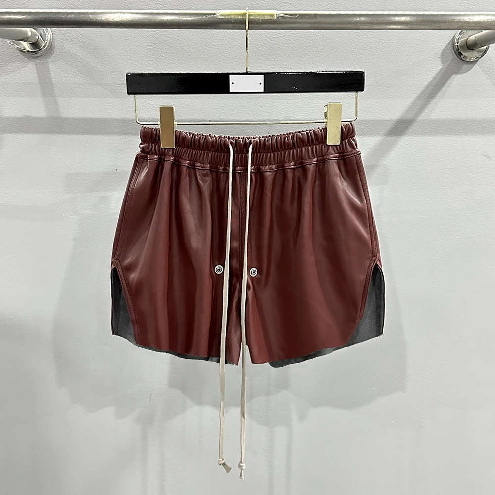 กางเกงขาสั้นผู้หญิง PU แบบมีเชือกรูดมีรูพรุนกางเกงเอวยางยืดผ่าข้างข้าง Y2k กางเกงหนังลำลองร้อยแบบลำลองใหม่2024ฤดูใบไม้ร่วง