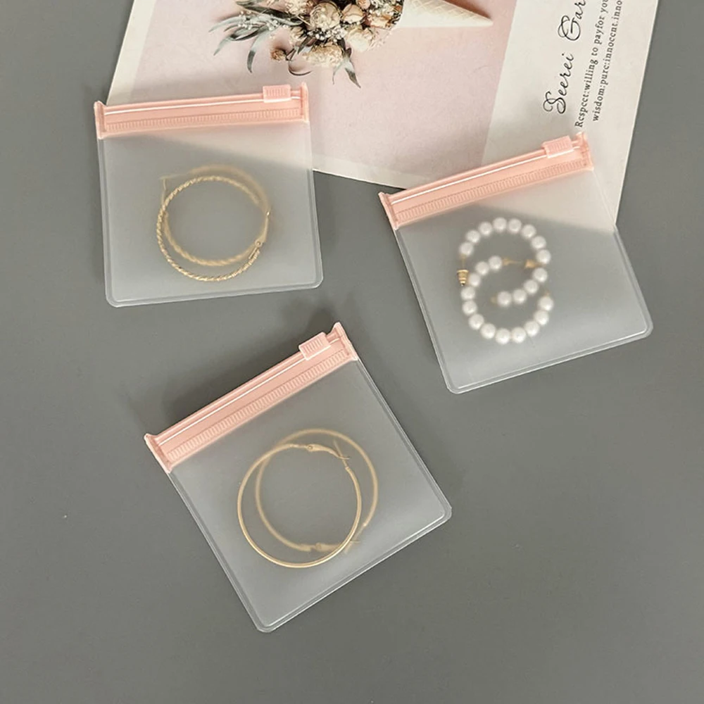 

Pink Zipper Frosted Jewelry Bags, Anti-Tarnish Plastic Pouches for Earrings, Necklaces, Small Business Packaging