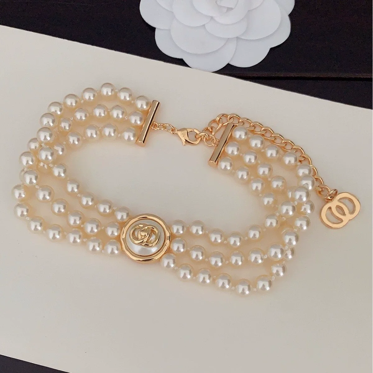 Luxury imitation pearl three-layer chain metal button design alloy classic necklace bracelet set fashion jewelry for women