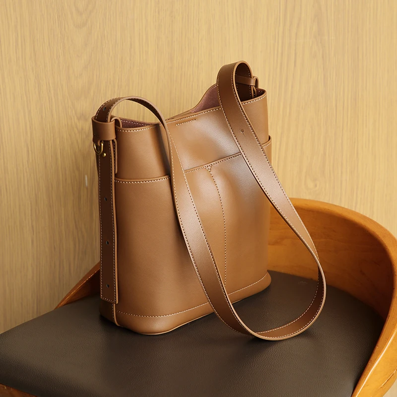 

New Cowhide Leisure Fashion Simple Bucket Bag Genuine Leather Hundred Shoulder Armpit Bag Senior Texture Cowhide Women's Bag