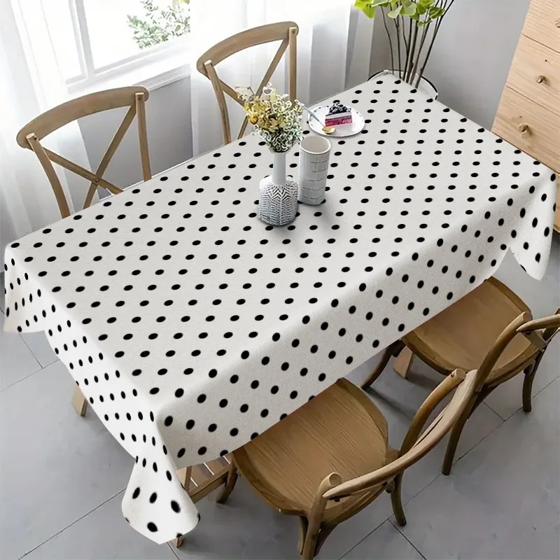 One black and white polka dot tablecloth - creating a simple and fashionable atmosphere. Classic polka dot tablecloth.