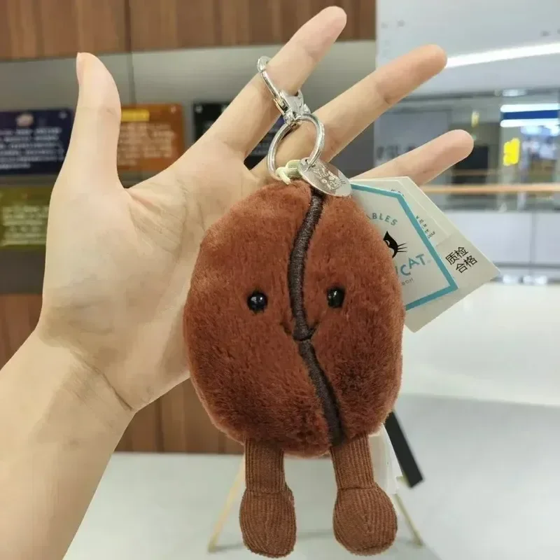 【متوفر】JELLYCAT UK قلادة كيس حبوب القهوة اللطيفة الممتعة مع حقيبة سلسلة مفاتيح حبوب القهوة Jellycat دمية قطيفة هدية عيد الميلاد والكريسماس