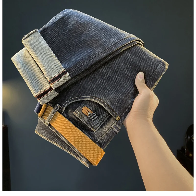 

Deep blue thick men's jeans 2025 autumn and winter trend new small foot elastic pants light l Versatile fashion