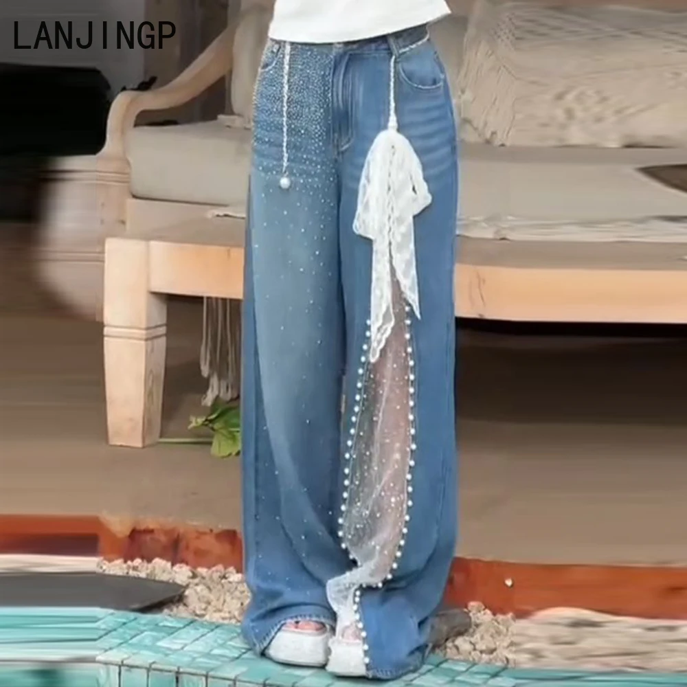 Mantianxing hot diamond mesh stitching heavy industry beaded jeans women's 2025 summer new drape wide-leg pants tide