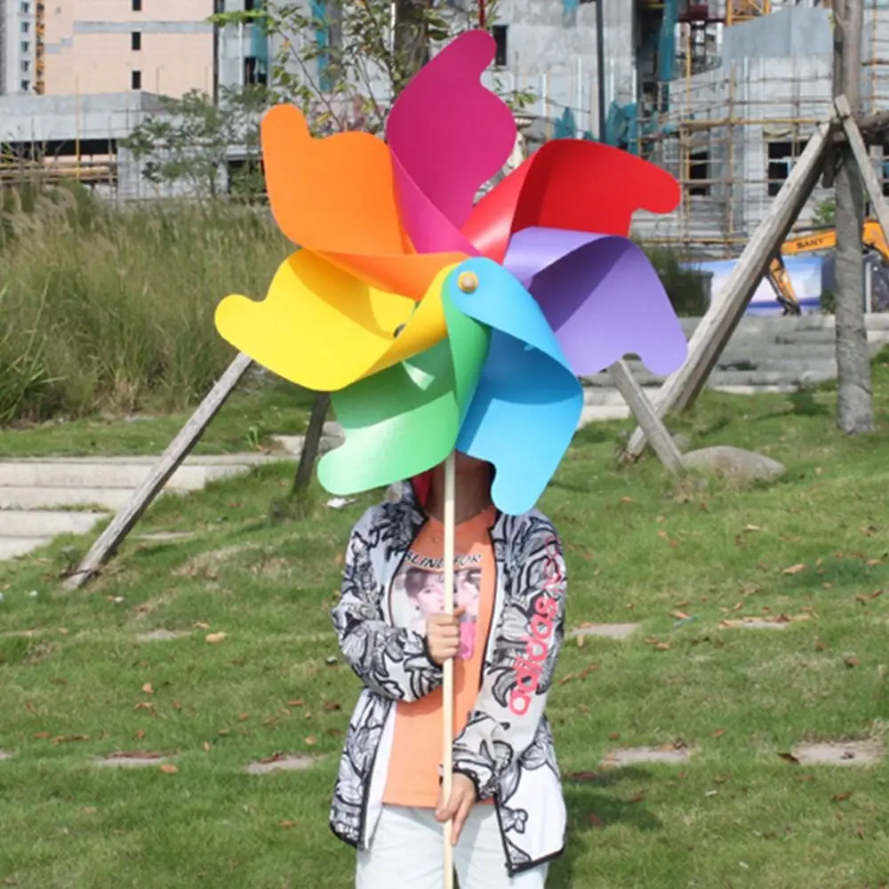 Nouveaux jouets de dessin animé pour enfants jouets pour enfants disposition moulinets jouets coloré tournesol moulins à vent en plastique fileurs à vent bricolage
