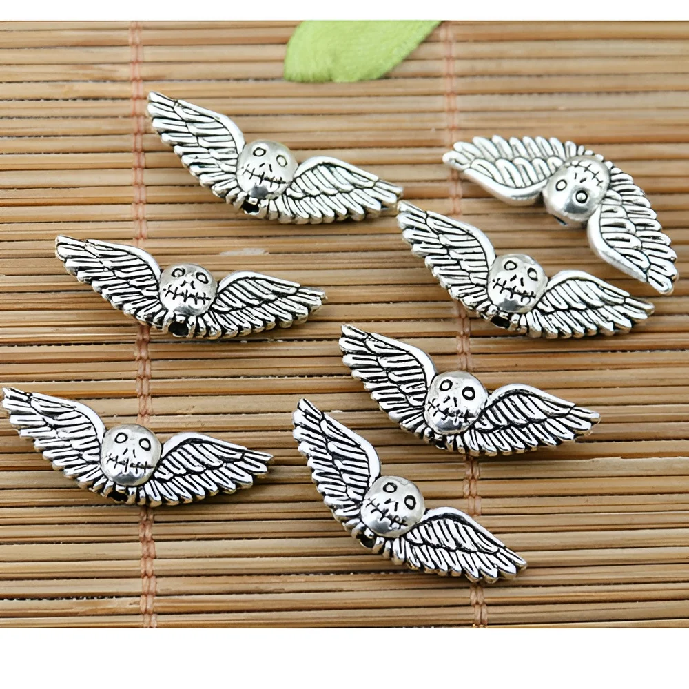 20pcs 8.3*25mm hole 1.8mm 2sided skull wing bead EF1782
