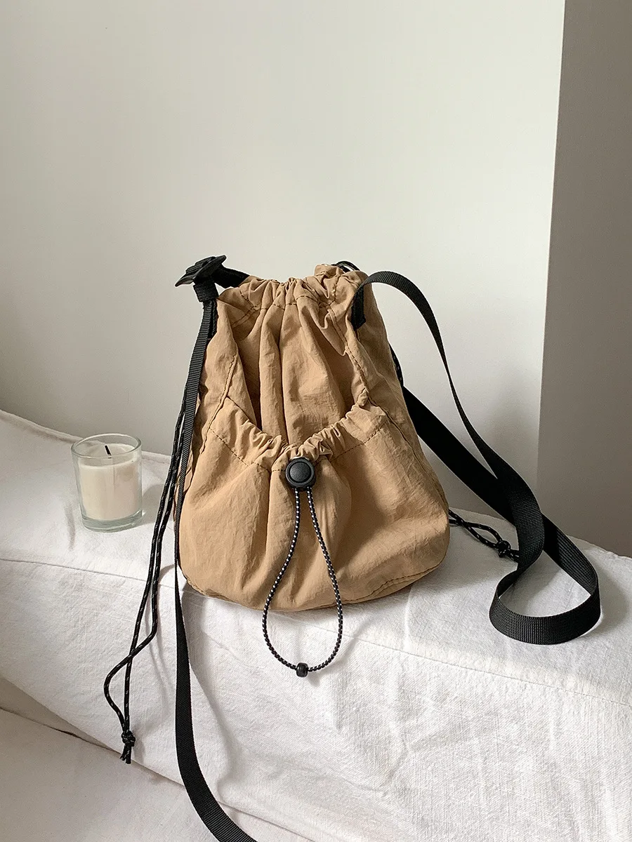 New nylon crossbody bucket bag for women casual trend shoulder bag design pull rope fold bag for women