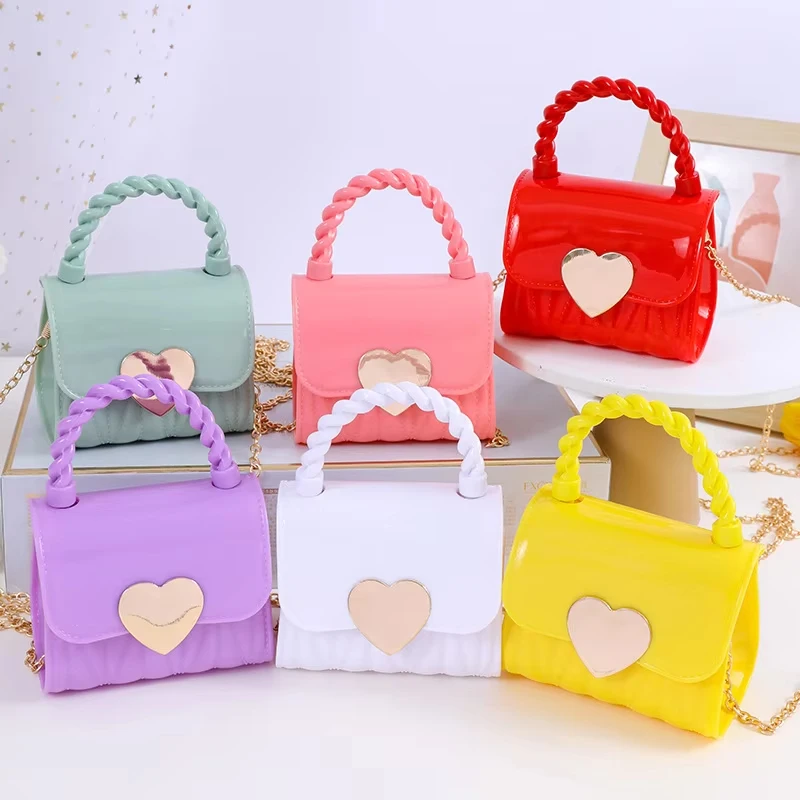 Dompet Koin PVC Anak-anak dengan Pola Hati Cantik Tas Tangan Mini Modis Tas Jelly Rantai Kecil untuk Anak Perempuan Aksesori Fashion Anak