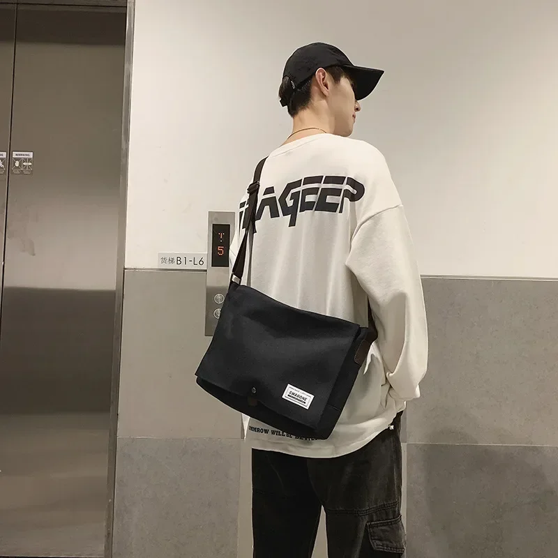 Bolsa casual de ombro único para homens, bolsa tiracolo marca maré, bolsa de lona japonesa para estudantes, grande capacidade, carteiro, nova, 2022