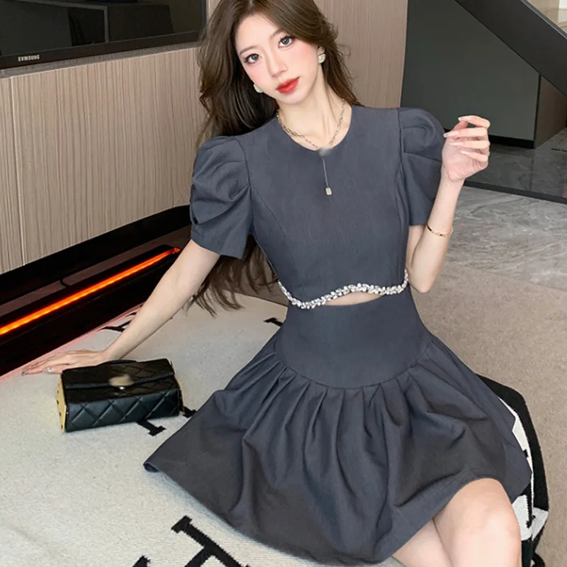 Minivestido sin mangas con tachuelas de diamantes para mujer, novedad de verano, aspecto fino, alto, manga corta, industria pesada, vestidos de estilo corto