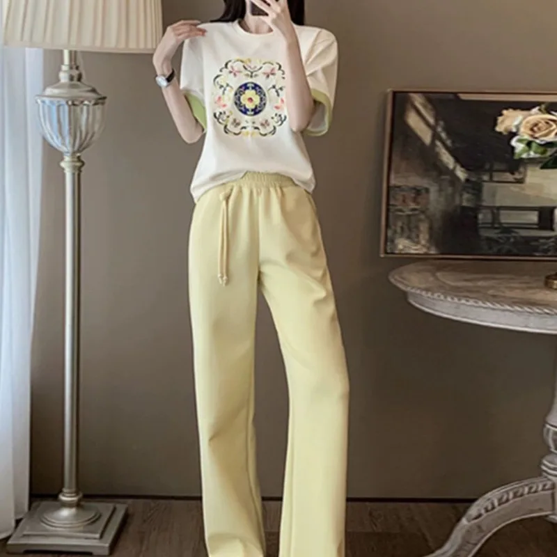 

Women Casual Sport Suit 2026 Summer New Arrival Stylish Youth Enhancing Short Sleeve T Shirt Loose Wide Leg Pants Two Piece Set