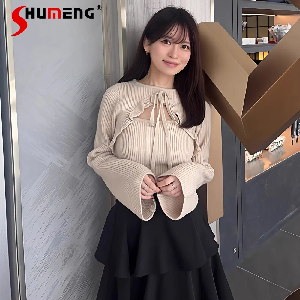 

Весенний женский свитер 2026 в японском стиле: элегантный, милый, с круглым вырезом, длинными рукавами, ажурной вязкой, оборками, шнуровкой и бантом