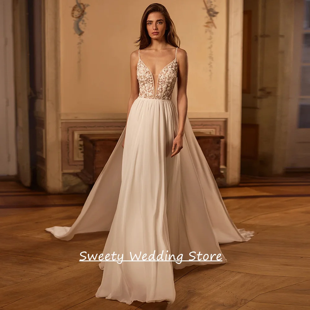 Neues Hochzeitskleid mit Umhang, maßgeschneidert, sexy V-Ausschnitt, ärmellos, Perlenapplikation, Illusion, A-Linie, Brautkleid, Sweep-Zug