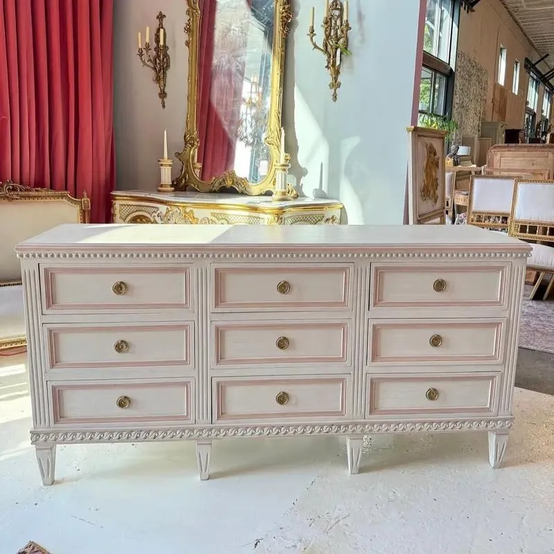 Large white nine-drawer cabinet with modern brass handle, wooden panels, living room storage furniture, modern home furniture