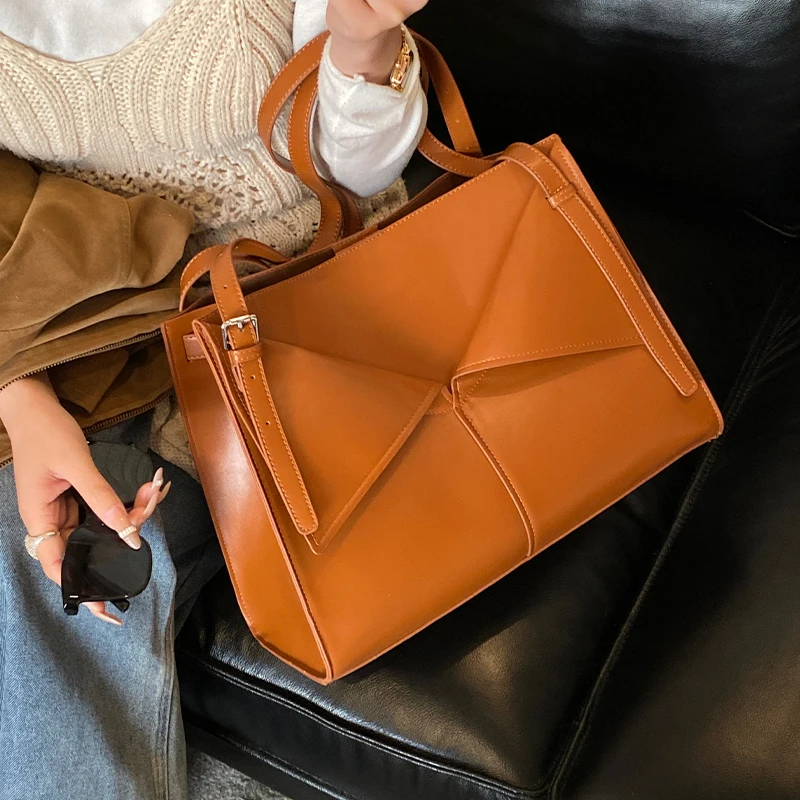 

Женская сумка с ручкой сверху, высококачественная нишевая дизайнерская сумка большой вместимости для поездок на работу на осень/зиму, однотонная женская сумка из искусственной кожи