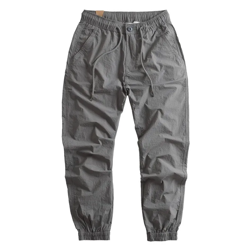 Nuovi pantaloni da lavoro in seta di ghiaccio da uomo 2024 larghi sottili Qui Dry pantaloni lunghi sportivi casual giapponese Sle elastico vestibilità ampia giovanile