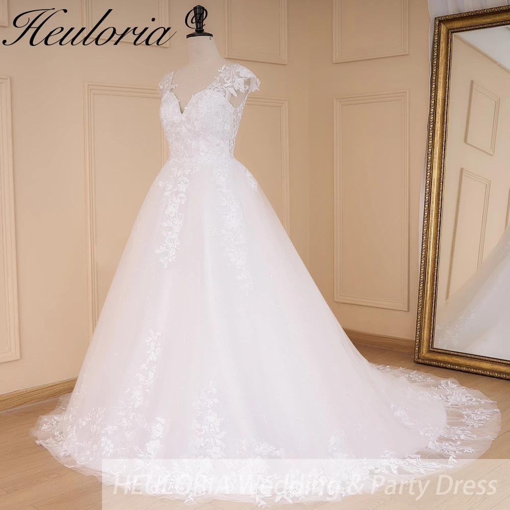 HEULORIA Elegant lace applique ball gown princess Wedding Dress V neck plus size shinny skirt bridal dress robe de mariee