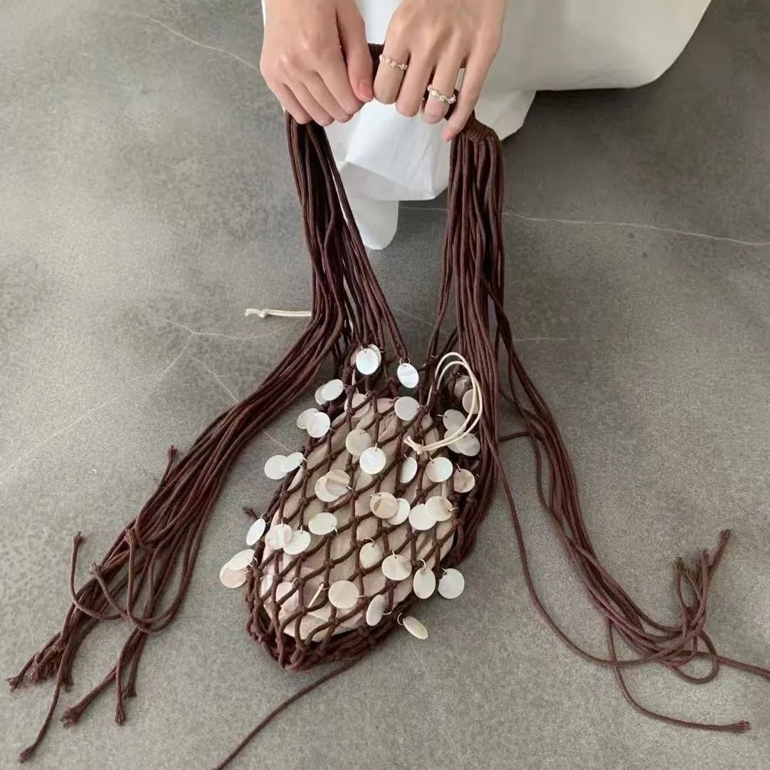

Hollow Tassel Bucket Bag Woven Mesh String Shoulder Bag Shell Sequins Handbag Women Bags Rope Crochet Beach Bags for Women Tote