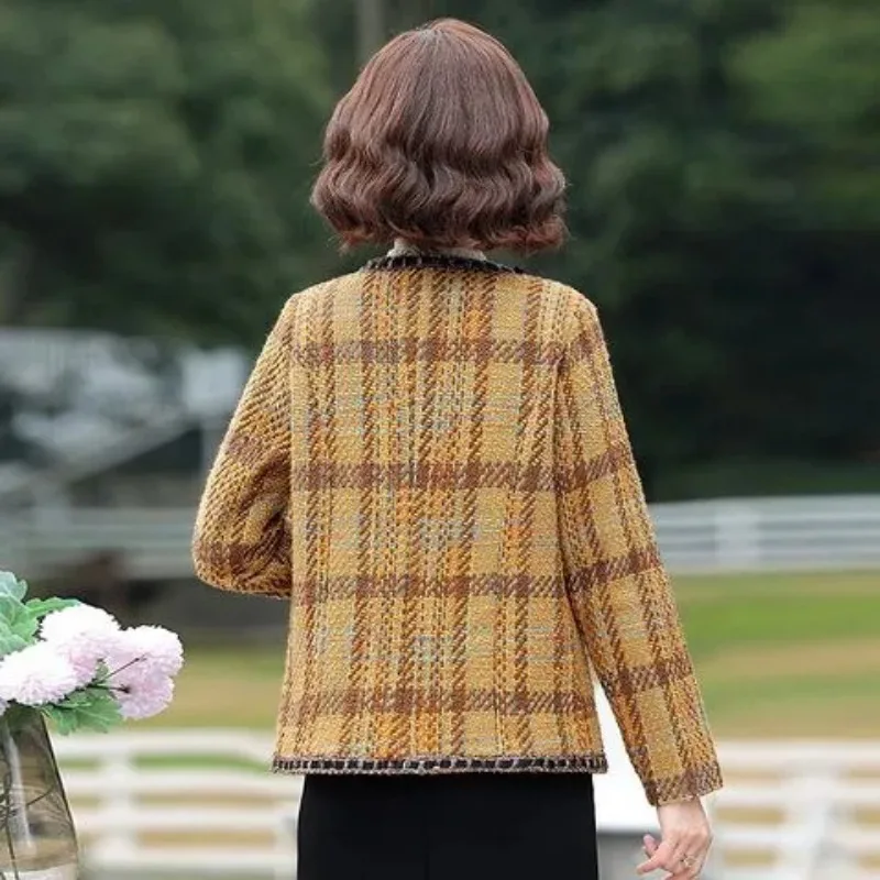 Herfst en winter vest met contrasterende knopen, geruite damesjas met lange mouwen, modieuze elegante top voor woon-werkverkeer