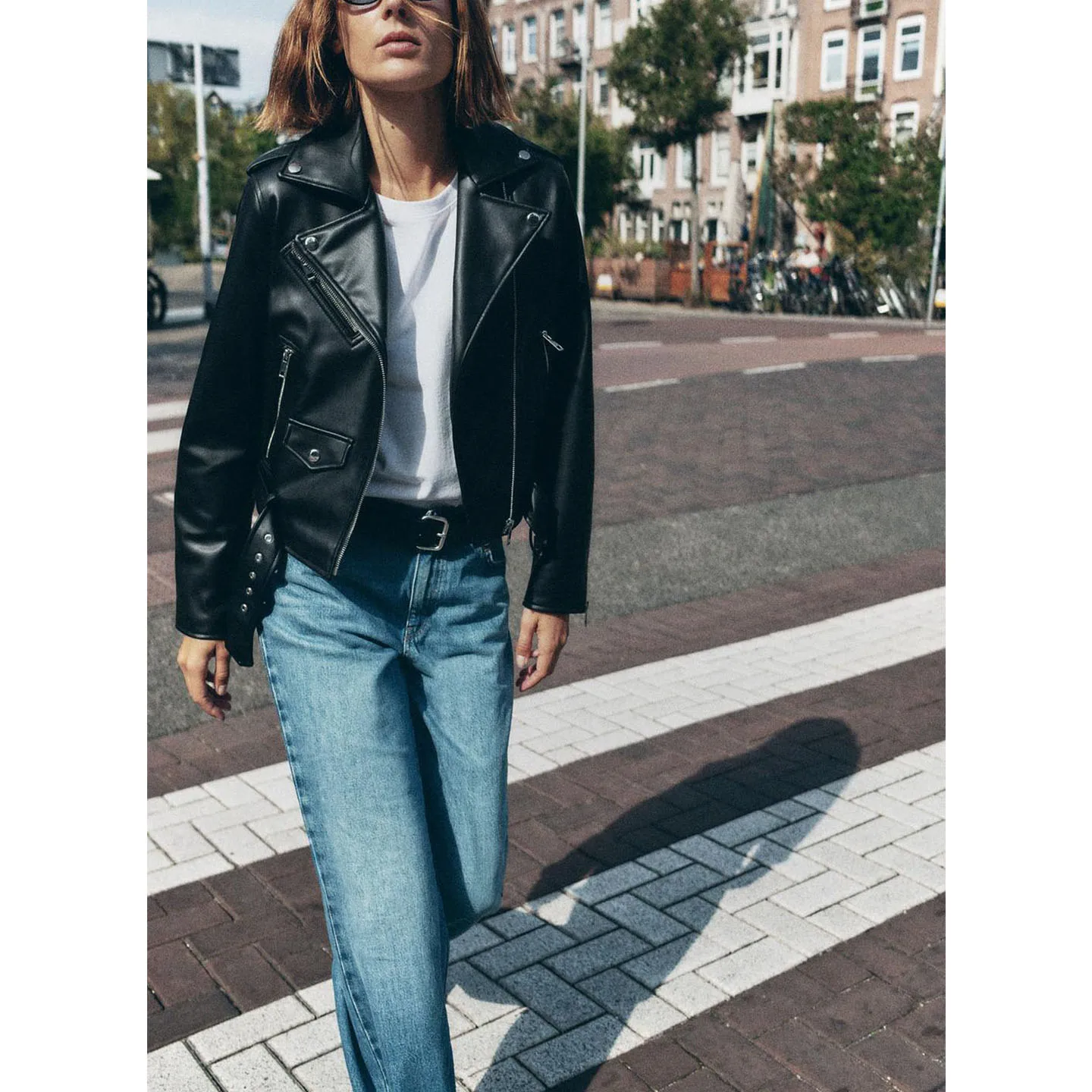 Autunno 2025 Cappotto da moto in pelle PU con cerniera lunga americana da donna in fibra di poliestere 00% senza marca