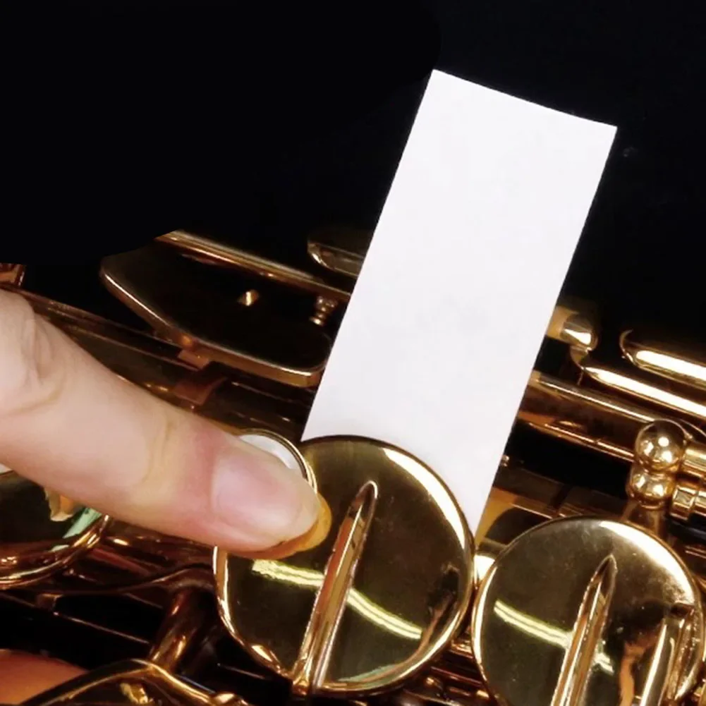 Uma caixa de fibras de papel absorvente folha de cuidados limpos papéis anti-pegajosos flauta sax clarinete botão absorvente pap (100 folhas) x 1