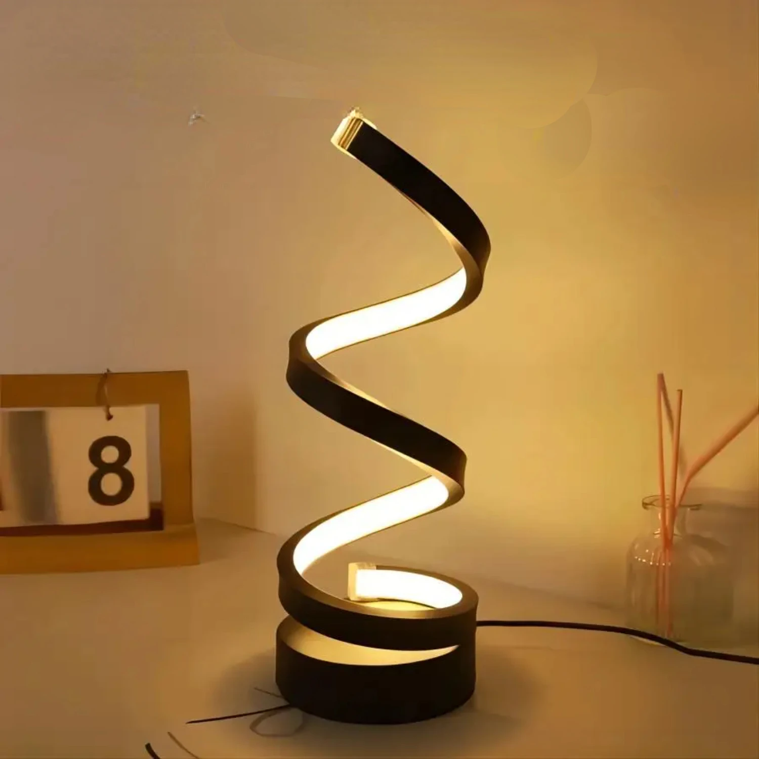 

Compact, Modern, and Elegant LED Spiral Table Lamp - Stylish and Inviting Nightstand Lamp for Warmth and Brightness in Living Ro