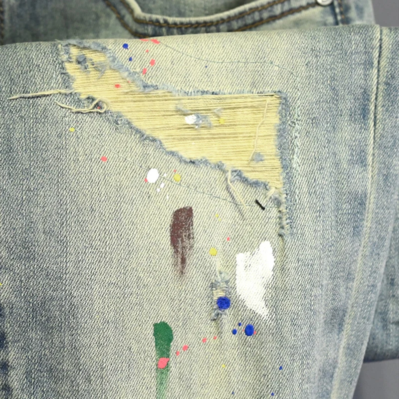 กางเกงยีนส์ผู้ชายสีฟ้าอ่อนรุ่นใหม่ทันสมัย ลายขีดข่วน ล้างน้ำ สไตล์ย้อนยุค ทรงสลิมฟิต ยืดได้ ดีไซน์เนอร์ยีนส์สไตล์เรโทร