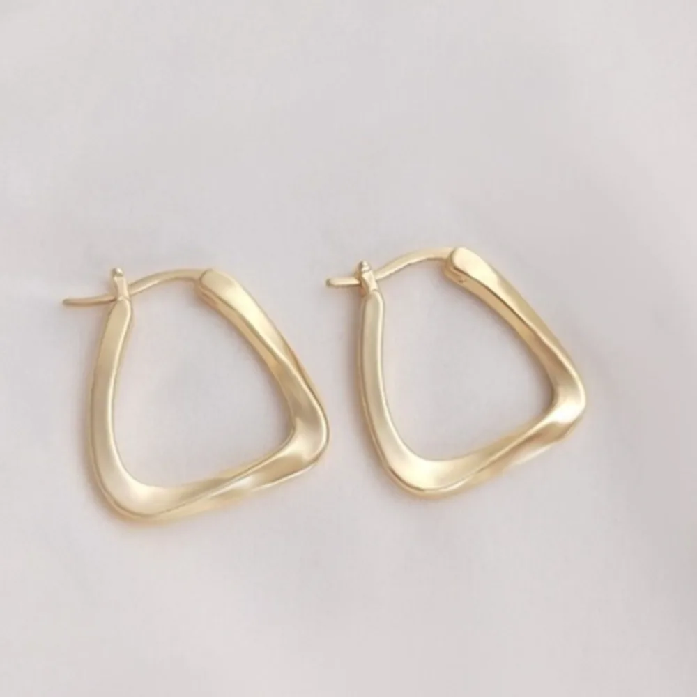 

Copper 14K Gold Color Geometric Twisted Metal Triangle Earrings Women's Light Luxury Earrings Niche Earrings