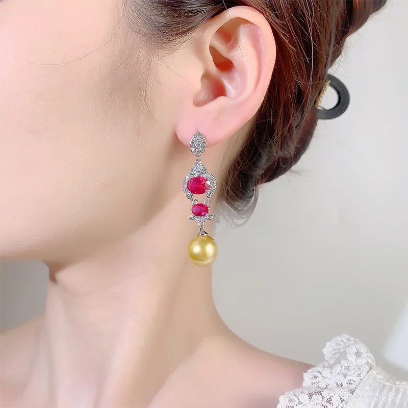 

Elegant Red Gem and Pearl Drop Earrings Luxurious Silver Setting with Crystal Accents Perfect for Formal Events and Evening Wear