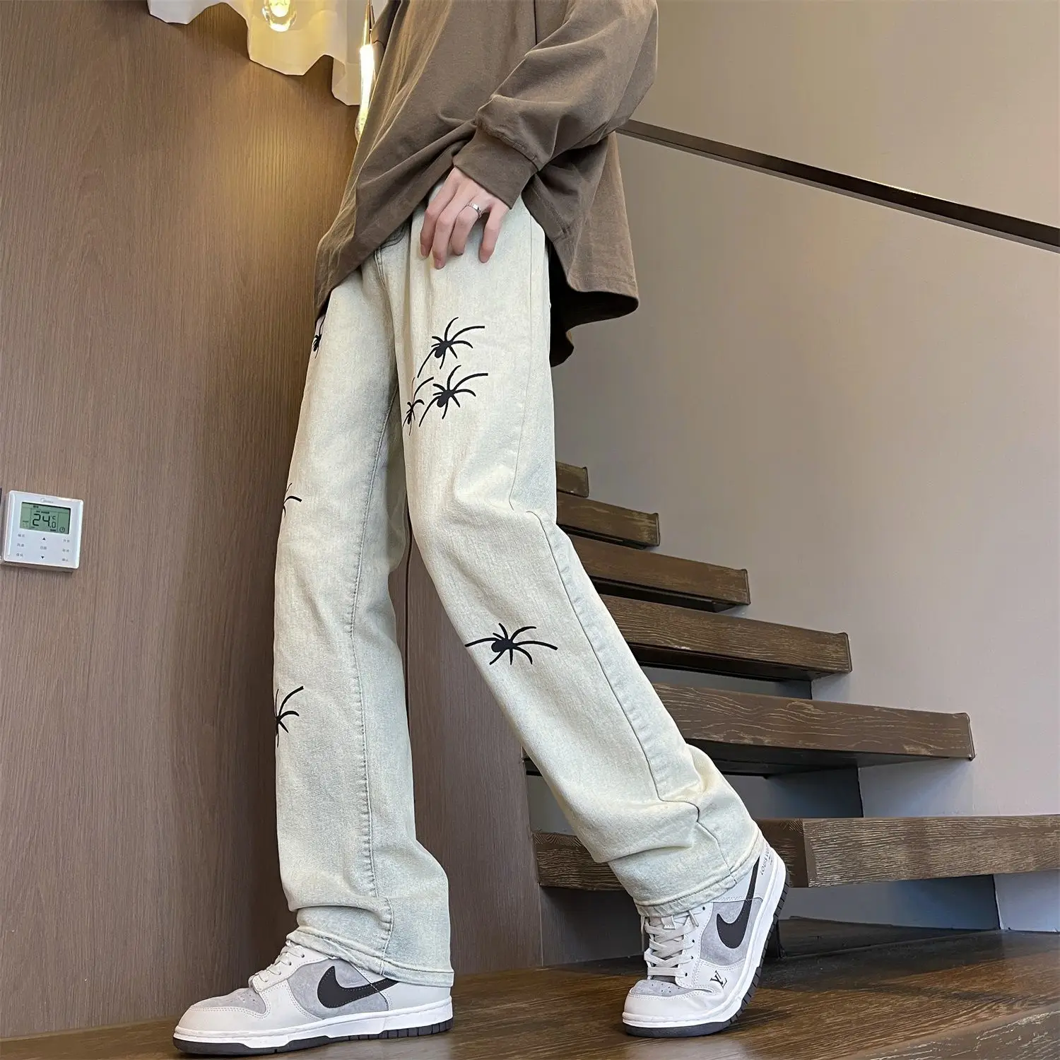 

Yellow mud spider print straight leg jeans for men and women in autumn trend loose fitting wide leg high street casual pants y2k