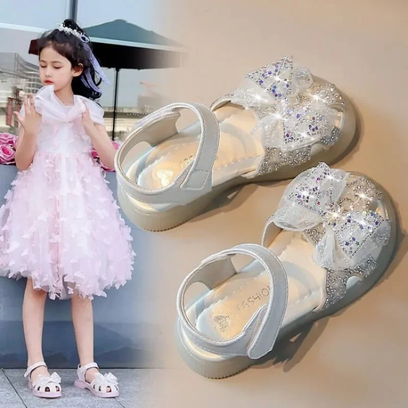 Sandalias de princesa con diamantes y lazo para niña, zapatos planos de Punta cerrada, talla 23 a 35, 2024