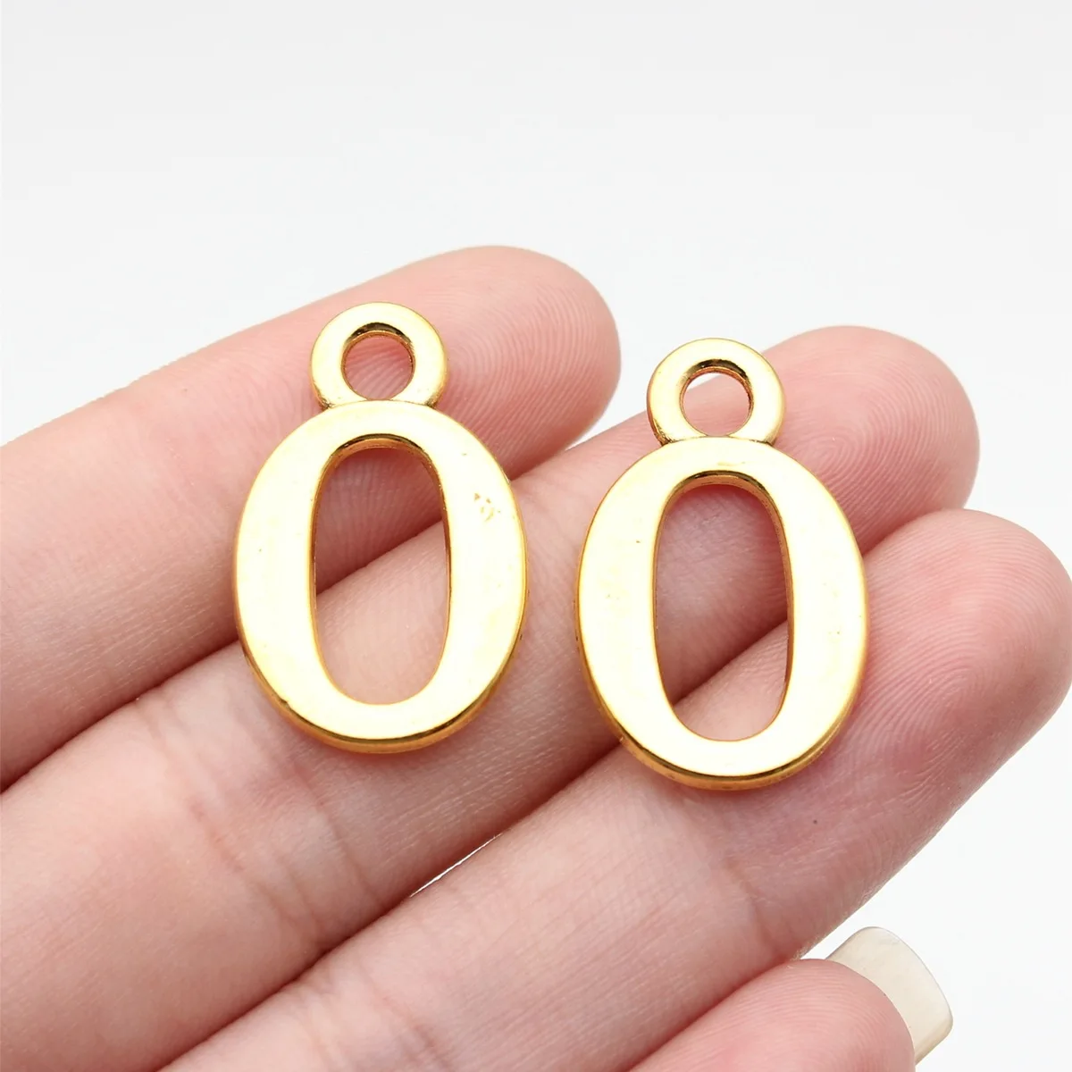10 piezas de dijes colgantes de números del 0 al 9, color oro antiguo, 26x16mm, accesorios de joyería DIY a granel