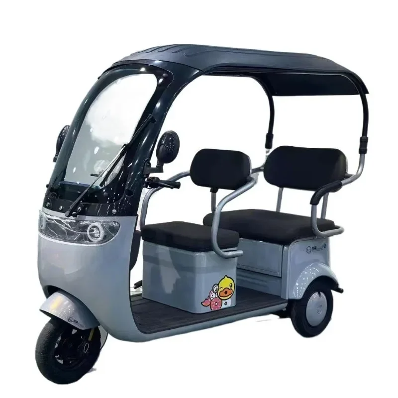 Rain-proof electric tricycle with shed to pick up and drop off children and elderly scooter