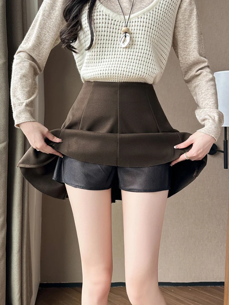 Czarna, ciepła, gruba wełniana spódnica damska w stylu preppy na zimę, z wysokim stanem, codzienna, szkolna, mini, krótka, trapezowa.