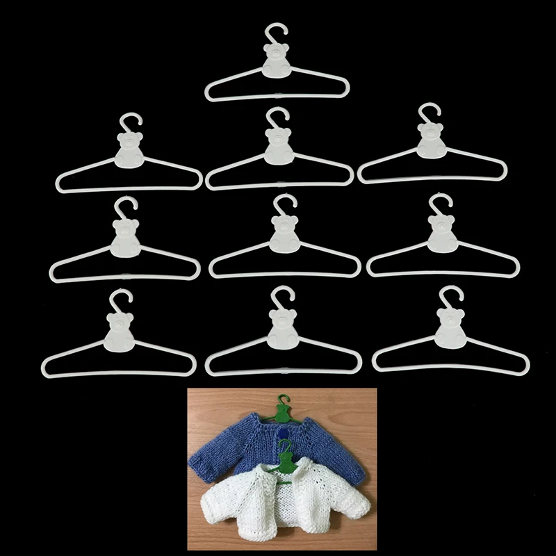 Mini cintres en plastique mignons, accessoires pour poupées, manteau, robe, robe, robe de beurre, vêtements, courses, jouet de maison, 10 pièces/lot