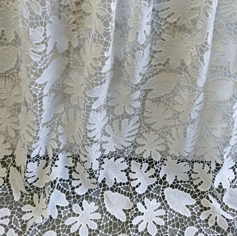 

New 100% cotton laser-embroidered leaf hollow-out women's clothing fabric, dress designer handmade DIY sewing material fabric