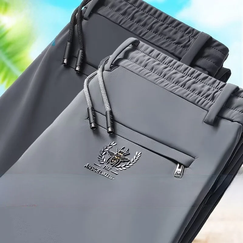 

Повседневные брюки из ледяного шелка, мужские летние тонкие дышащие свободные прямые брюки Busin West, эластичная рабочая одежда большого размера