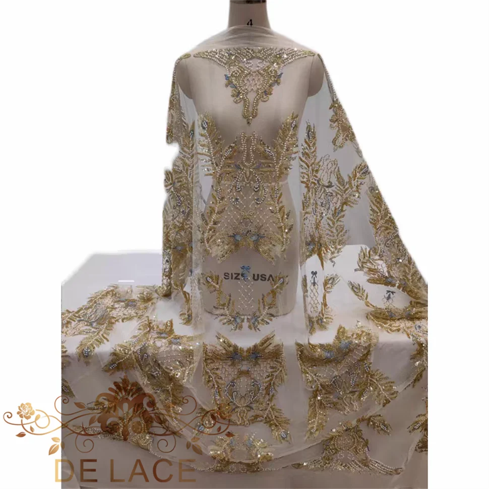 

Роскошное золотое кружево с уникальным узором, расшитое бисером и блестками, ткань для свадебного платья, кружевная ткань с жемчугом