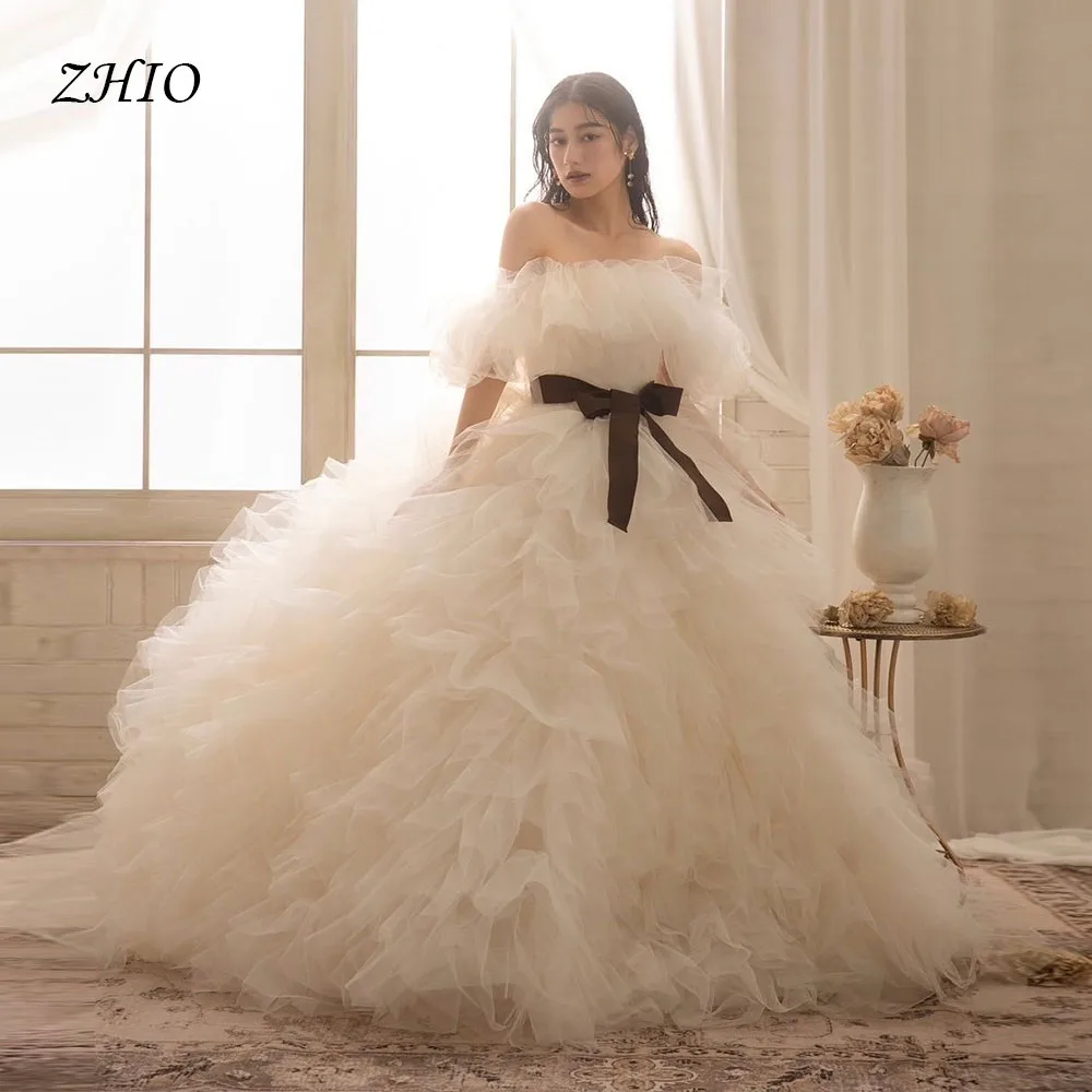 ZHIO Off Shoulder Champagne Tulle Ball Gown with Ruffles Puffy Sleeves Black Bow Bridal Prom Dress Custom Wedding Dress